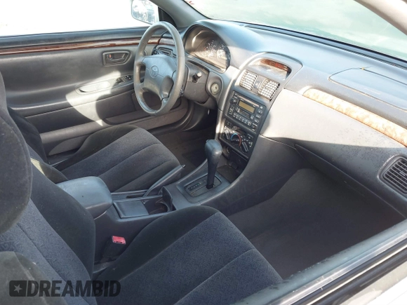1999 Toyota Solara SE with VIN 2T1CF22P4XC169312, listed as a IAAI auction lot 41581888 with 99,791 mi miles and . Bid and sale history available at carsss.com. Image 5.