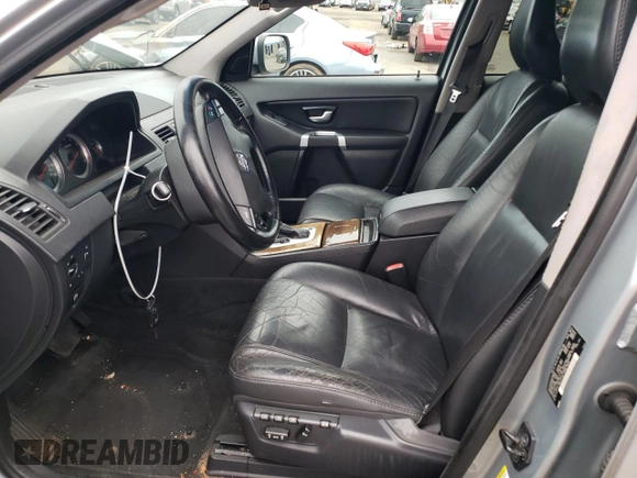 2012 Volvo XC90 z VIN YV4952CZ0C1618347, wystawiony jako Copart lot #64658345 z przebiegiem 157 326 mil mil oraz Szkoda całkowita • Salvage title. Historia ofert i sprzedaży dostępna na DreamBid. Obrazek 7.
