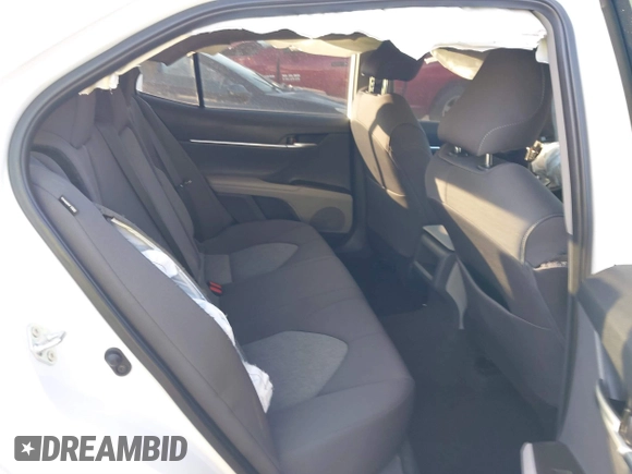 2024 Toyota Camry LE z VIN 4T1R11AK6RU888622, wystawiony jako IAAI lot #41102520 z przebiegiem 12 717 mil mil oraz . Historia ofert i sprzedaży dostępna na DreamBid. Obrazek 8.