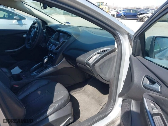 2012 Ford Focus Titanium with VIN 1FAHP3N20CL402944, listed as a IAAI auction lot 41784935 with NaN miles. Bid and sale history available at carsss.com. Image 5.