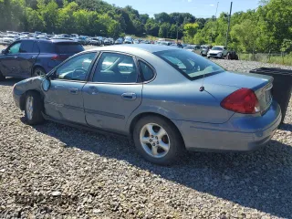 2001 Ford Taurus SE with VIN 1FAFP53U61A161763, listed as a Copart auction lot 43317165 with 64,025 mi miles and Salvage title. Bid and sale history available at DreamBid. Image 2.