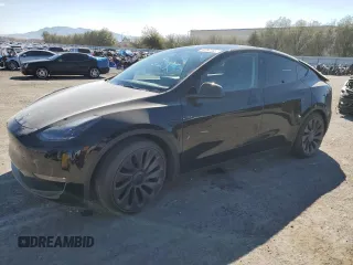 2023 Tesla Model Y Performance with VIN 7SAYGDEF7PF924355, listed as a Copart auction lot 47877055 with 64,663 mi miles and Salvage Title. Bid and sale history available at DreamBid. Image 1.