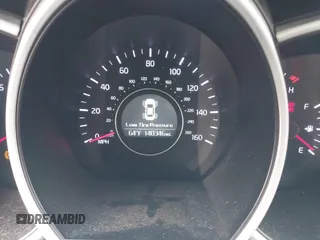 2015 Kia Optima LX with VIN KNAGM4A70F5644189, listed as a IAAI auction lot 42141090 with 140,346 mi miles. Bid and sale history available at carsss.com. Image 7.