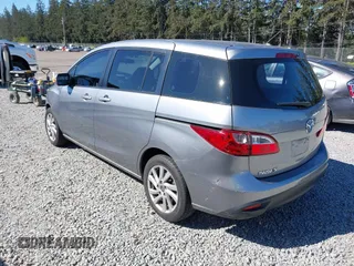 2014 Mazda 5 Sport z VIN JM1CW2BL0E0172678, wystawiony jako IAAI lot #42192057 z przebiegiem 89 848 mil mil oraz . Historia ofert i sprzedaży dostępna na DreamBid. Obrazek 3.