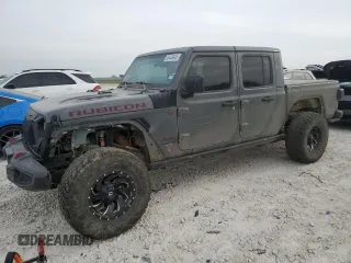 2020 Jeep Gladiator Rubicon z VIN 1C6JJTBG9LL150356, wystawiony jako Copart lot #50449445 z przebiegiem 77 849 mil mil oraz Szkoda całkowita • Salvage title. Historia ofert i sprzedaży dostępna na DreamBid. Obrazek 1.