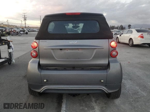 2013 Smart fortwo Passion z VIN WMEEK3BA4DK644622, wystawiony jako Copart lot #84966644 z przebiegiem 78 657 mil mil oraz Szkoda całkowita • Salvage title. Historia ofert i sprzedaży dostępna na DreamBid. Obrazek 6.
