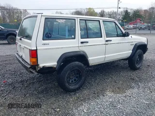 1996 Jeep Cherokee SE with VIN 1J4FJ28S3TL241251, listed as a IAAI auction lot 42073050 with 156,523 mi miles and . Bid and sale history available at DreamBid. Image 4.