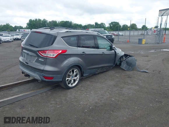 2013 Ford Escape Titanium with VIN 1FMCU0J92DUB36428, listed as a IAAI auction lot 42144682 with 263,600 mi miles and . Bid and sale history available at carsss.com. Image 4.