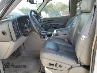 2005 GMC Yukon SLE with VIN 1GKEC13T15J230550, listed as a Copart auction lot 77214624 with 203,095 mi miles and Salvage Title. Bid and sale history available at carsss.com. Image 7.