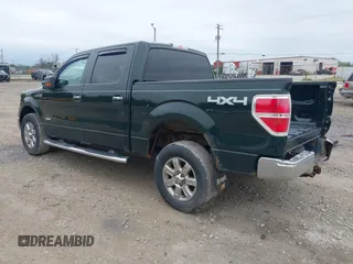 2013 Ford F-150 XL with VIN 1FTFW1ETXDFA33723, listed as a IAAI auction lot 39711808 with 112,922 mi miles. Bid and sale history available at carsss.com. Image 3.