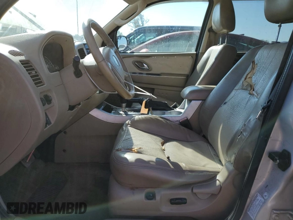 2007 Mercury Mariner with VIN 4M2CU39H87KJ11108, listed as a Copart auction lot 74314124 with 225,901 mi miles and Salvage title. Bid and sale history available at DreamBid. Image 7.
