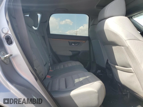 2019 Honda CR-V EX z VIN 5J6RW1H56KA035208, wystawiony jako Copart lot #51822295 z przebiegiem 82 813 mil mil oraz Szkoda całkowita • Salvage title. Historia ofert i sprzedaży dostępna na DreamBid. Obrazek 11.