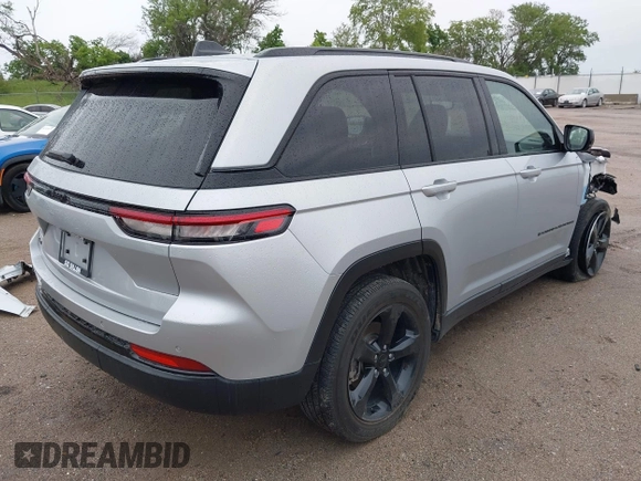 2023 Jeep Grand Cherokee Altitude with VIN 1C4RJHAG8PC611840, listed as a IAAI auction lot 42336992 with 41,100 mi miles and . Bid and sale history available at DreamBid. Image 4.