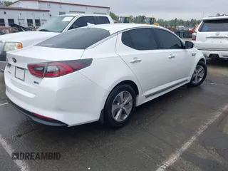 2016 Kia Optima Hybrid with VIN KNAGM4AD9G5092084, listed as a IAAI auction lot 41879089 with 141,927 mi miles. Bid and sale history available at carsss.com. Image 4.