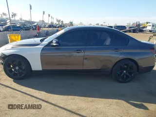 2014 BMW 3 Series 328i with VIN WBA3A5C56EP603819, listed as a IAAI auction lot 41217764 with 156,140 mi miles and . Bid and sale history available at carsss.com. Image 14.