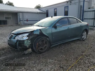2009 Pontiac G6 1SB z VIN 1G2ZJ57B994254129, wystawiony jako Copart lot #85312614 z przebiegiem 242 321 mil mil oraz Szkoda całkowita • Salvage title. Historia ofert i sprzedaży dostępna na DreamBid. Obrazek 1.