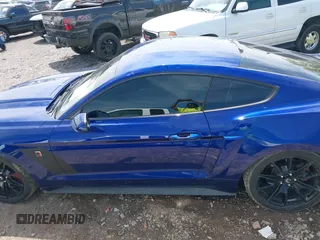 2015 Ford Mustang V6 with VIN 1FA6P8AM7F5312159, listed as a IAAI auction lot 42095665 with 113,693 mi miles and . Bid and sale history available at DreamBid. Image 14.