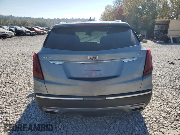 2023 Cadillac XT5 FWD Premium Luxury with VIN 1GYKNCRS6PZ100071, listed as a Copart auction lot 76248224 with 25,613 mi miles and Salvage Title. Bid and sale history available at carsss.com. Image 6.