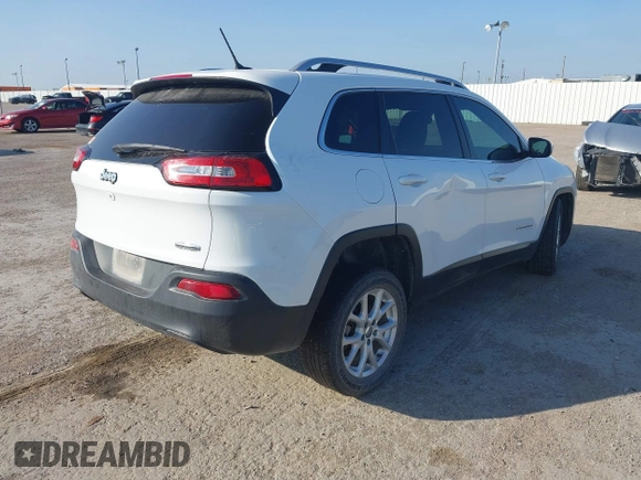 2018 Jeep Cherokee Latitude with VIN 1C4PJLCB2JD511083, listed as a IAAI auction lot 42070152 with 135,752 mi miles. Bid and sale history available at carsss.com. Image 4.