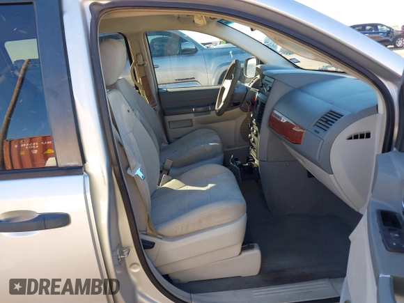 2008 Chrysler Town & Country LX with VIN 2A8HR44H38R115587, listed as a IAAI auction lot 41035823 with 167,564 mi miles and . Bid and sale history available at DreamBid. Image 5.