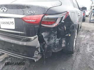 2021 Infiniti Q50 Luxe z VIN JN1EV7BP6MM702075, wystawiony jako IAAI lot #41720913 z przebiegiem 31 092 mil mil oraz . Historia ofert i sprzedaży dostępna na DreamBid. Obrazek 6.