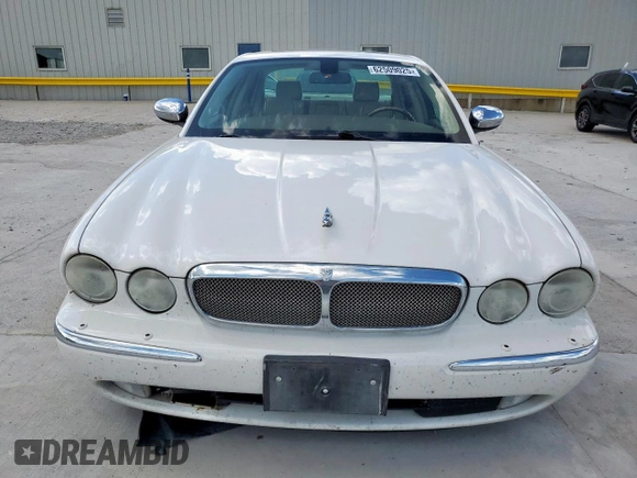 2006 Jaguar XJ Vanden Plas with VIN SAJWA82B16SH06996, listed as a Copart auction lot 62509025 with 80,236 mi miles and Salvage title. Bid and sale history available at DreamBid. Image 5.