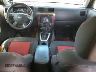 2007 Hummer H3 SUV z VIN 5GTDN13E978192698, wystawiony jako Copart lot #57357245 z przebiegiem 213 079 mil mil oraz Szkody całkowita. Historia ofert i sprzedaży dostępna na DreamBid. Obrazek 8.
