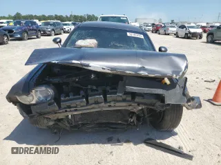 2013 Dodge Challenger SXT z VIN 2C3CDYAG6DH554175, wystawiony jako Copart lot #52185285 z przebiegiem 99 036 mil mil oraz Szkoda całkowita • Salvage title. Historia ofert i sprzedaży dostępna na DreamBid. Obrazek 5.