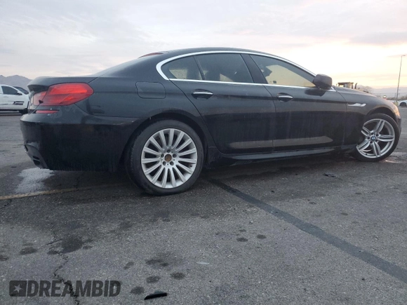 2013 BMW 6 Series 650i with VIN WBA6B2C50DD128323, listed as a Copart auction lot 43059985 with 106,861 mi miles and Clean Title. Bid and sale history available at DreamBid. Image 3.