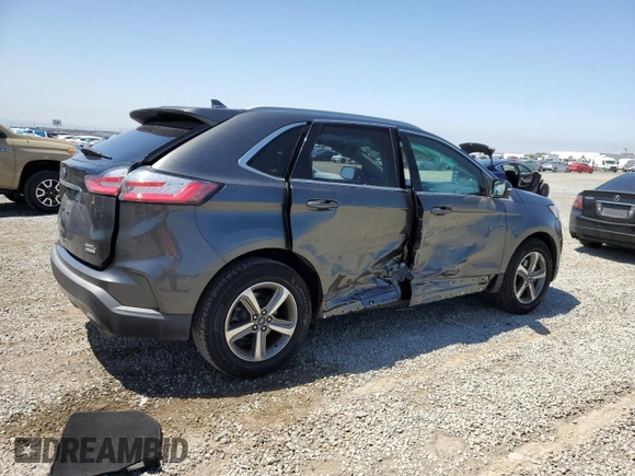 2020 Ford Edge SEL с VIN 2FMPK3J97LBA48892, выставлен на аукционе Copart как лот 58008145 с пробегом 52 588 миль миль и Списание • Salvage title. История ставок и продаж доступна на DreamBid. Изображение 3.