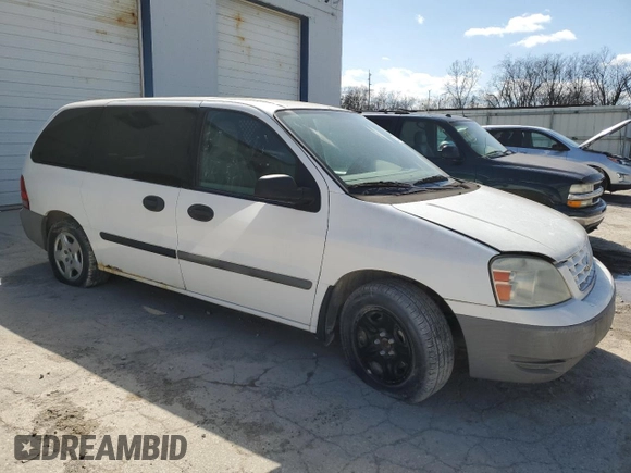 2007 Ford Freestar Cargo z VIN 2FTZA54647BA13617, wystawiony jako Copart lot #52545745 z przebiegiem Nie podano mil oraz Szkody całkowita. Historia ofert i sprzedaży dostępna na DreamBid. Obrazek 4.