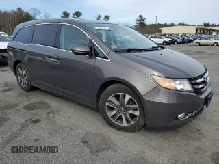 2015 Honda Odyssey Touring Elite with VIN 5FNRL5H95FB117971, listed as a Copart auction lot 52083475 with 82,626 mi miles and Salvage Title. Bid and sale history available at DreamBid. Image 4.