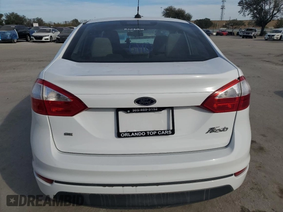 2014 Ford Fiesta SE with VIN 3FADP4BJ6EM151199, listed as a Copart auction lot 43125995 with 104,512 mi miles and Salvage Title. Bid and sale history available at DreamBid. Image 6.