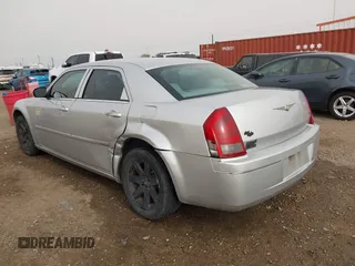 2006 Chrysler 300 Touring with VIN 2C3KA53G36H384442, listed as a IAAI auction lot 41817539 with 129,123 mi miles. Bid and sale history available at carsss.com. Image 3.