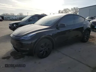 2025 Tesla Model Y Long Range with VIN 7SAYGAEE7SF215150, listed as a Copart auction lot 46276075 with 5,444 mi miles and Salvage Title. Bid and sale history available at DreamBid. Image 1.