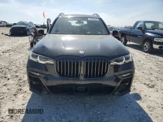 2022 BMW X7 M50i z VIN 5UXCX6C0XN9M94389, wystawiony jako Copart lot #49696505 z przebiegiem 22 908 mil mil oraz Szkody całkowita. Historia ofert i sprzedaży dostępna na DreamBid. Obrazek 5.