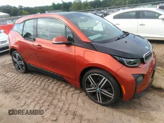 2014 BMW i3 with VIN WBY1Z4C57EV276421, listed as a IAAI auction lot 42667600 with 82,105 mi miles and . Bid and sale history available at DreamBid. Image 1.