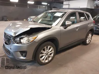 2014 Mazda CX-5 Grand Touring with VIN JM3KE4DY9E0373974, listed as a IAAI auction lot 42073693 with 86,755 mi miles. Bid and sale history available at carsss.com. Image 17.