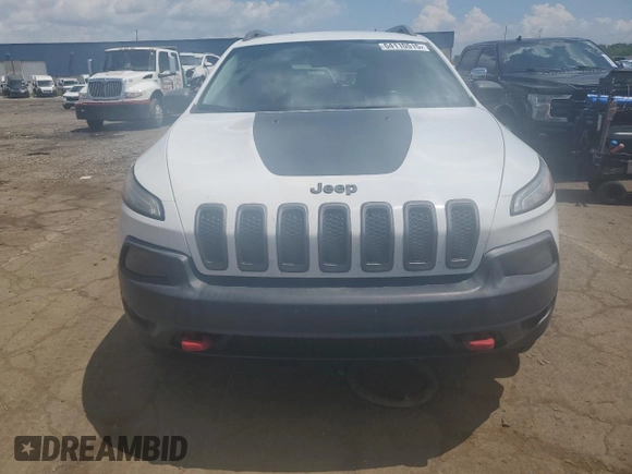 2015 Jeep Cherokee Trailhawk with VIN 1C4PJMBSXFW651000, listed as a Copart auction lot 64110515 with 135,571 mi miles and Clean title. Bid and sale history available at DreamBid. Image 5.