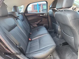 2014 Ford Focus Titanium with VIN 1FADP3N21EL274263, listed as a Copart auction lot 64017905 with 211,775 mi miles and Clean title. Bid and sale history available at DreamBid. Image 10.