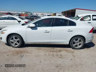 2012 Volvo S60 T5 with VIN YV1622FS5C2115706, listed as a IAAI auction lot 41864741 with 217,321 mi miles. Bid and sale history available at carsss.com. Image 14.