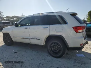 2013 Jeep Grand Cherokee Overland with VIN 1C4RJECT7DC588233, listed as a Copart auction lot 52672605 with 231,329 mi miles and Salvage Title. Bid and sale history available at carsss.com. Image 2.
