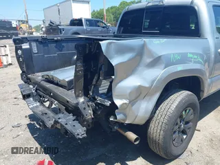 2023 Toyota Tacoma SR with VIN 3TYCZ5AN2PT141576, listed as a IAAI auction lot 42492127 with 43,431 mi miles and . Bid and sale history available at DreamBid. Image 6.