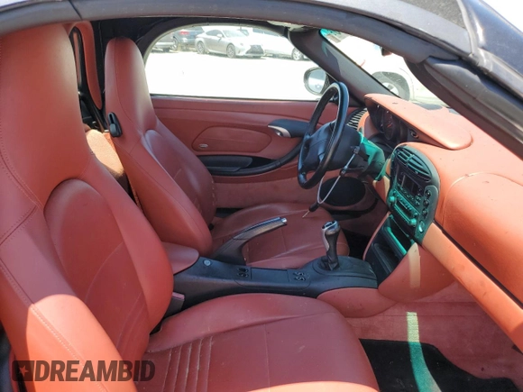 2000 Porsche Boxster с VIN WP0CA2983YU620909, выставлен на аукционе Copart как лот 58087035 с пробегом 99 845 миль миль и Чистый • Clean title. История ставок и продаж доступна на DreamBid. Изображение 10.