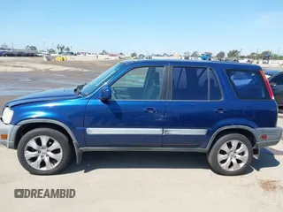 1998 Honda CR-V EX with VIN JHLRD1865WC042846, listed as a IAAI auction lot 41980332 with 209,914 mi miles. Bid and sale history available at carsss.com. Image 14.
