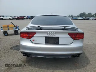 2015 Audi RS 7 с VIN WAUW2CFC5FN013049, выставлен на аукционе Copart как лот 57957093 с пробегом 95 826 миль миль и . История ставок и продаж доступна на DreamBid. Изображение 6.