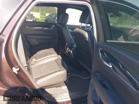 2021 Cadillac XT5 FWD Premium Luxury with VIN 1GYKNCRSXMZ118990, listed as a IAAI auction lot 41991857 with 92,085 mi miles and . Bid and sale history available at DreamBid. Image 8.