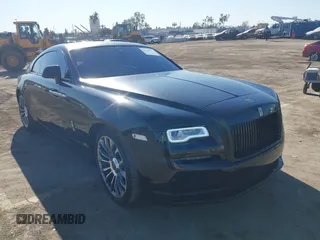 2016 Rolls-Royce Wraith z VIN SCA665C51GUX85992, wystawiony jako IAAI lot #41344751 z przebiegiem 42 675 mil mil oraz . Historia ofert i sprzedaży dostępna na DreamBid. Obrazek 1.