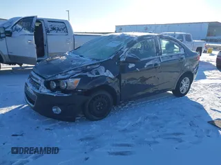 2015 Chevrolet Sonic LT z VIN 1G1JC5SH8F4194265, wystawiony jako IAAI lot #40945117 z przebiegiem 77 229 mil mil oraz . Historia ofert i sprzedaży dostępna na DreamBid. Obrazek 17.