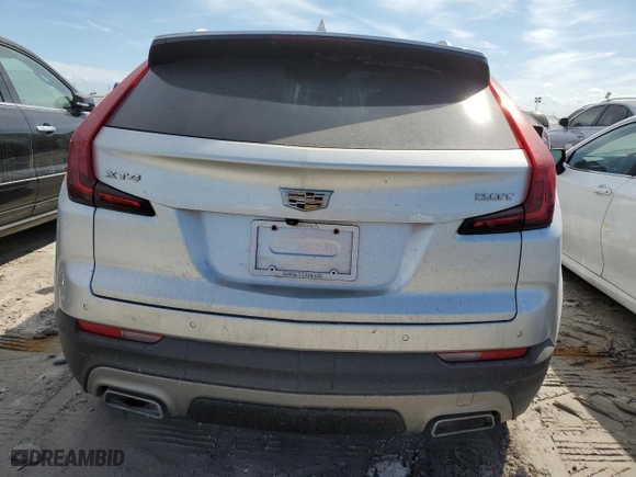 2019 Cadillac XT4 FWD Premium Luxury with VIN 1GYFZCR42KF147440, listed as a Copart auction lot 83146254 with 0 mi miles and Salvage Title. Bid and sale history available at carsss.com. Image 6.
